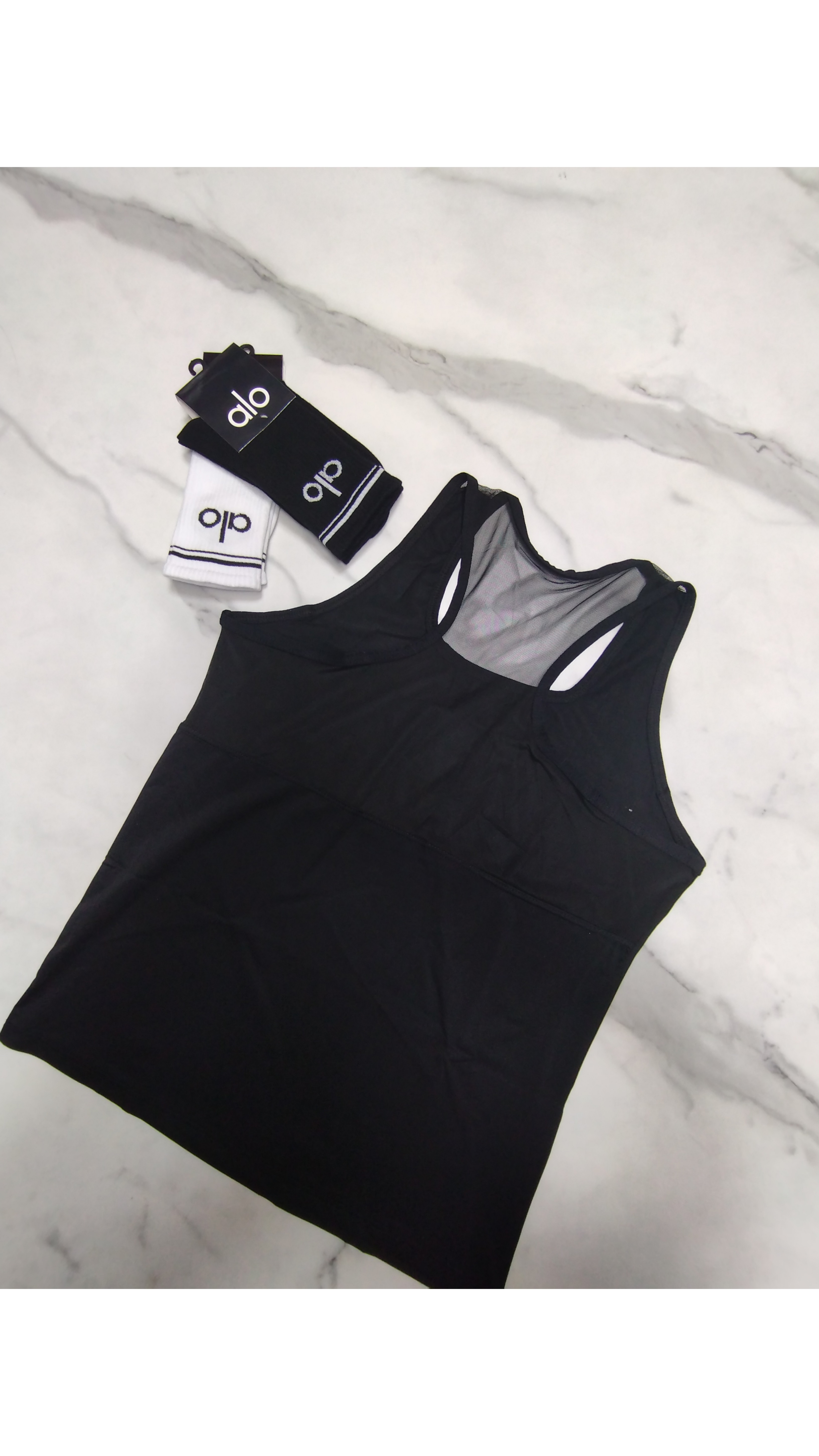 تاپ پشت تور ورزشی زنانه